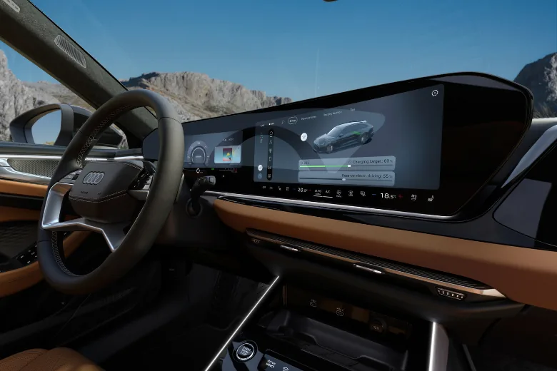 Interior del Audi A6 con volante, salpicadero y pantallas digitales